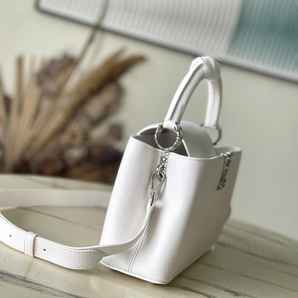 CAPUCINES EAST-WEST 33 IN WHITE CALFSKIN SILVER HARDWARE
