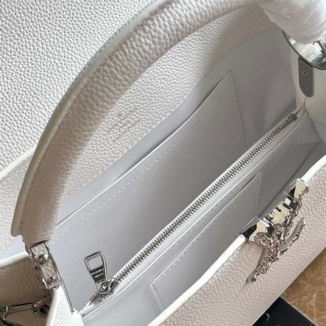 CAPUCINES EAST-WEST 33 IN WHITE CALFSKIN SILVER HARDWARE