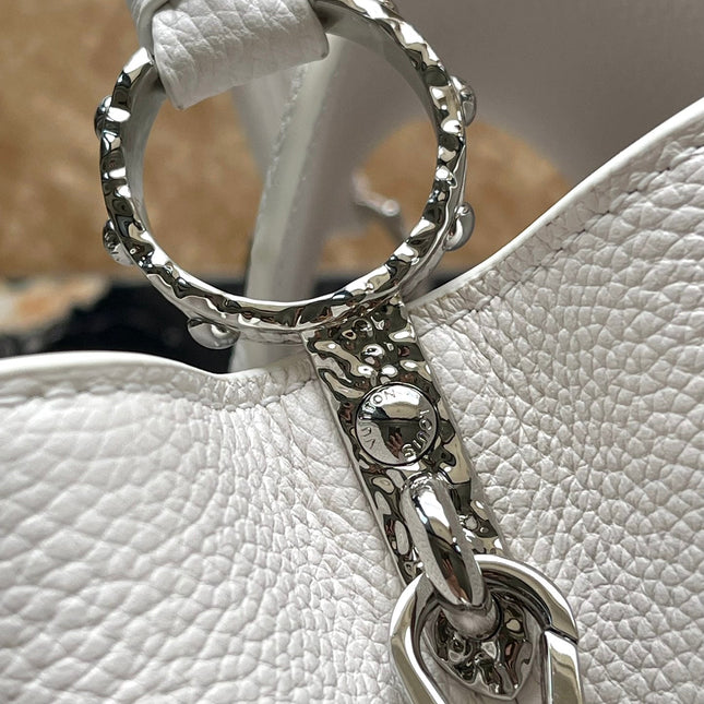 CAPUCINES EAST-WEST 33 IN WHITE CALFSKIN SILVER HARDWARE