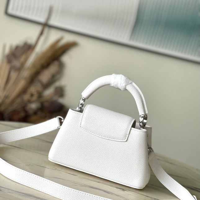 CAPUCINES EAST-WEST MINI 22 IN WHITE CALFSKIN SILVER HARDWARE