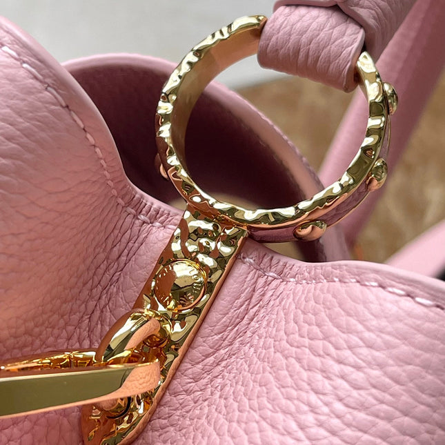 CAPUCINES EAST-WEST 33 IN BLUSH PINK CALFSKIN GOLD HARDWARE