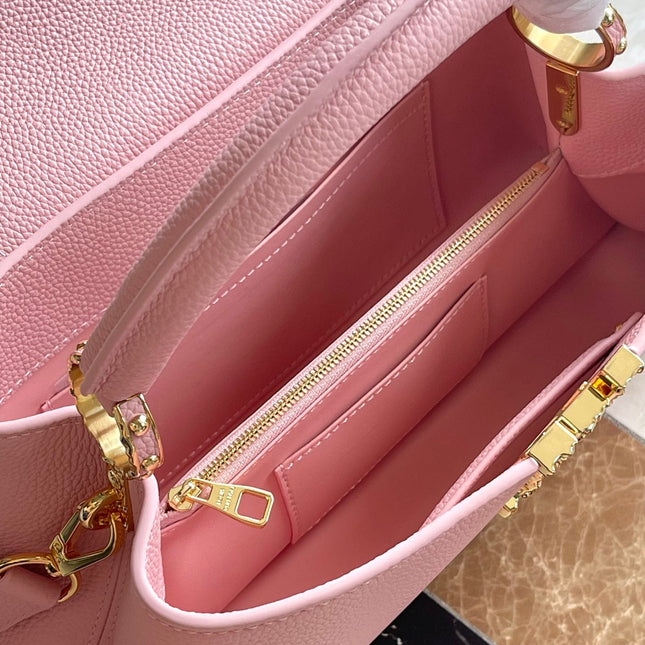 CAPUCINES EAST-WEST 33 IN BLUSH PINK CALFSKIN GOLD HARDWARE