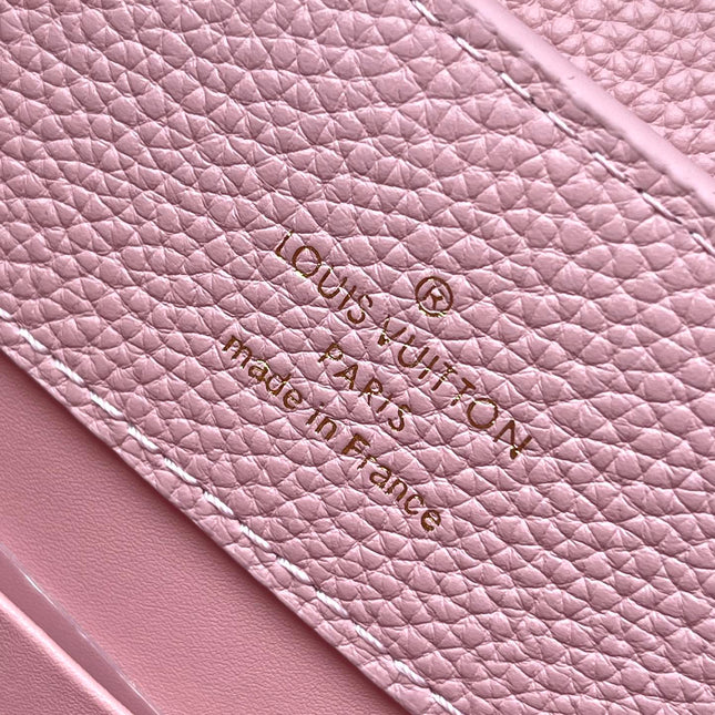 CAPUCINES EAST-WEST 33 IN BLUSH PINK CALFSKIN GOLD HARDWARE