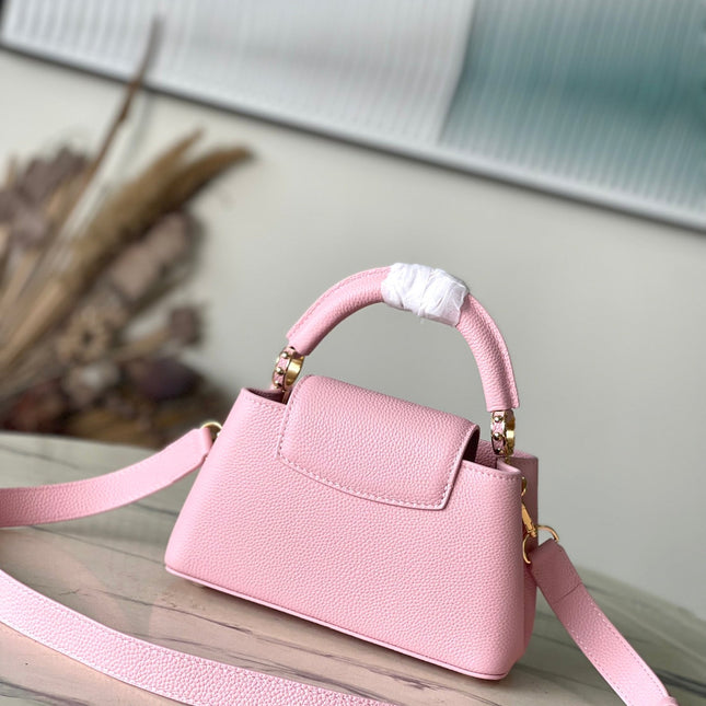 CAPUCINES EAST-WEST MINI 22 IN BLUSH PINK CALFSKIN GOLD HARDWARE
