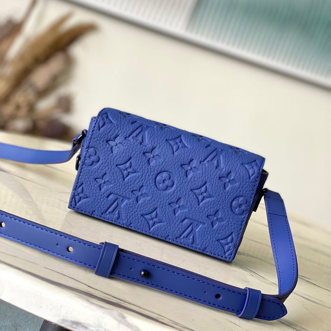 STEAMER 18 IN SAPPHIRE BLUE MONOGRAM EMBOSSED TAURILLON