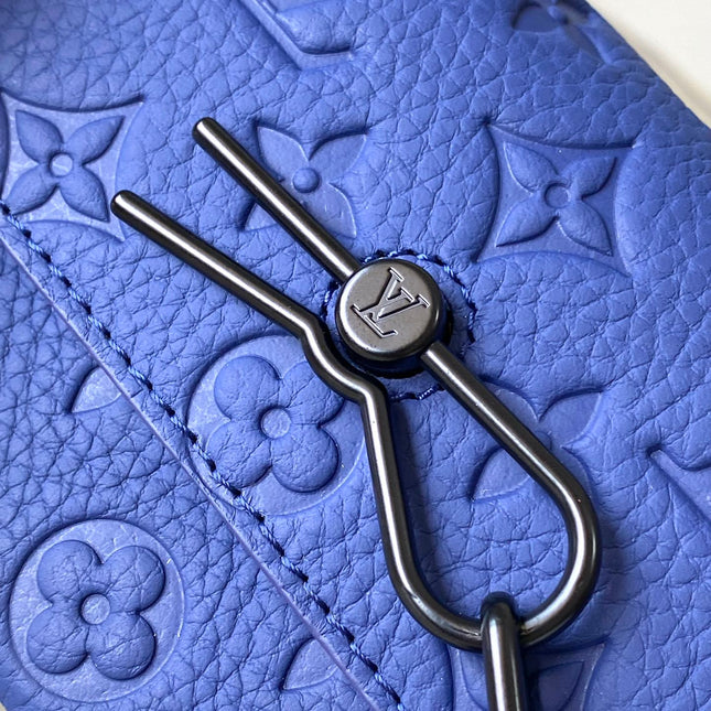 STEAMER 18 IN SAPPHIRE BLUE MONOGRAM EMBOSSED TAURILLON