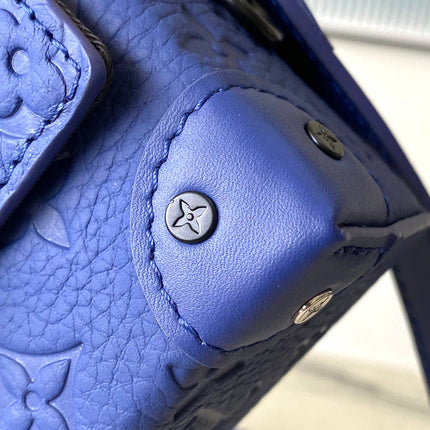 STEAMER 18 IN SAPPHIRE BLUE MONOGRAM EMBOSSED TAURILLON