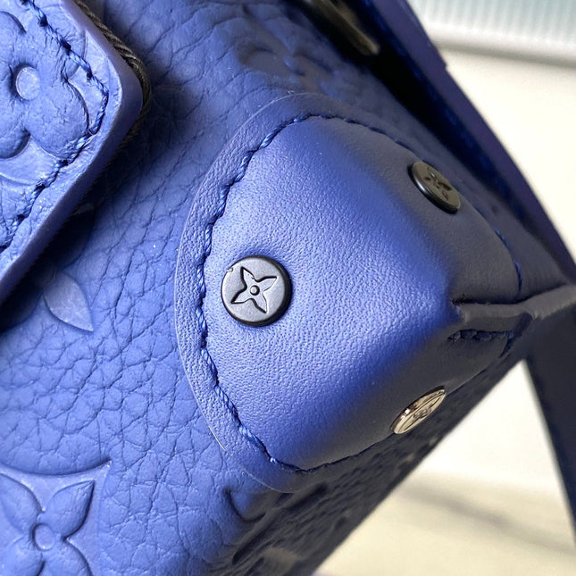 STEAMER 18 IN SAPPHIRE BLUE MONOGRAM EMBOSSED TAURILLON