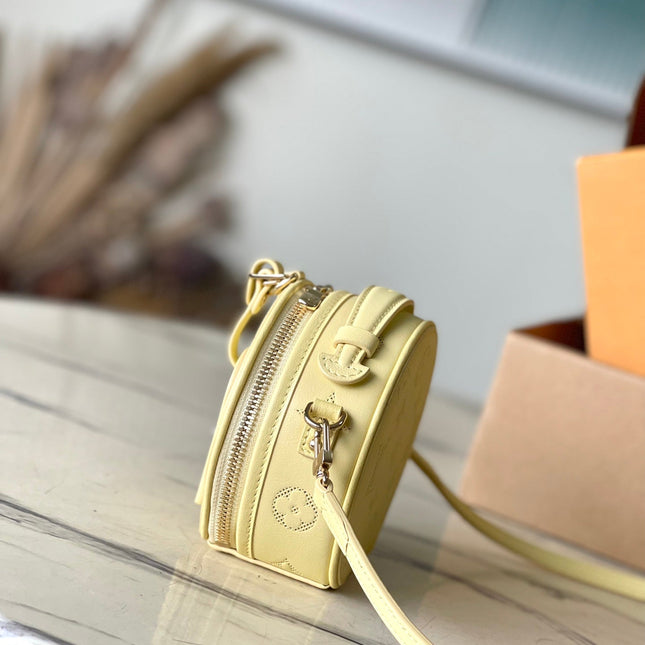 MINI BOITE CHAPEAU 13 IN BANANA YELLOW MONOGRAM PERFORATED CALFSKIN