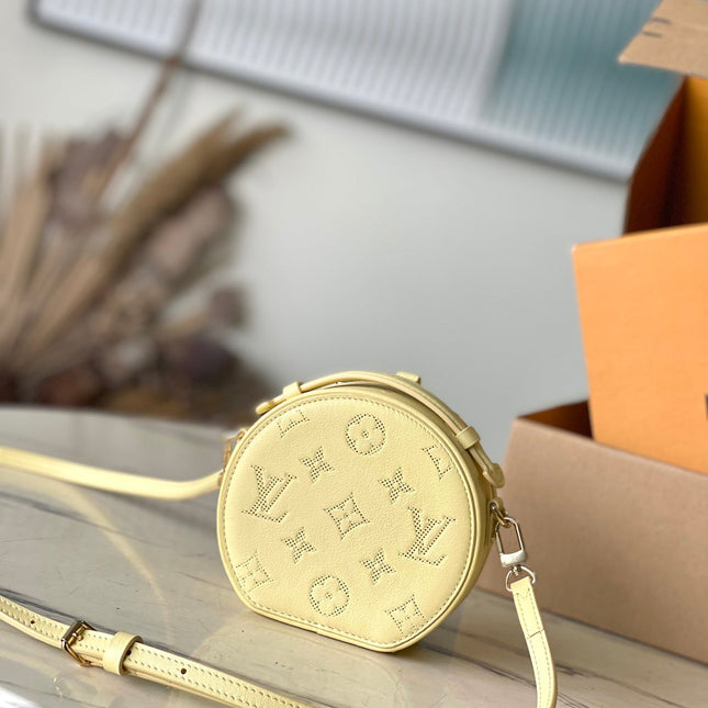 MINI BOITE CHAPEAU 13 IN BANANA YELLOW MONOGRAM PERFORATED CALFSKIN