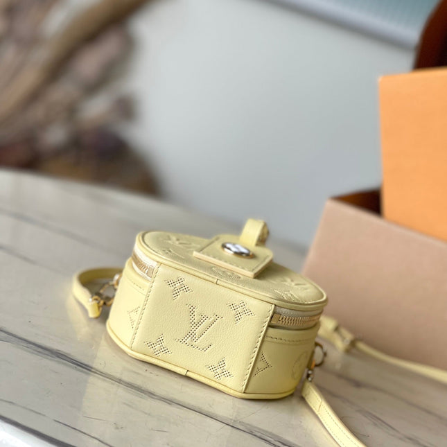 MINI BOITE CHAPEAU 13 IN BANANA YELLOW MONOGRAM PERFORATED CALFSKIN
