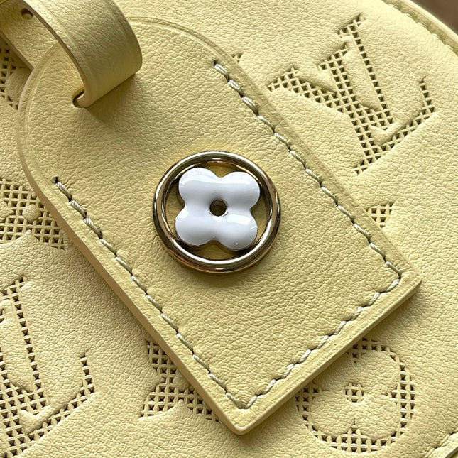 MINI BOITE CHAPEAU 13 IN BANANA YELLOW MONOGRAM PERFORATED CALFSKIN