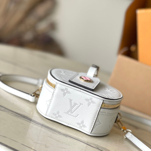 MINI BOITE CHAPEAU 13 IN WHITE MONOGRAM PERFORATED CALFSKIN