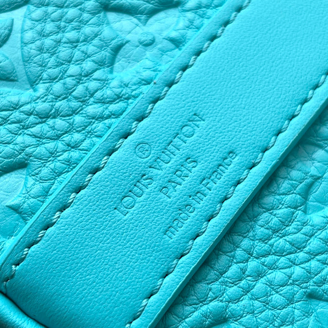 KEEPALL BANDOULIÈRE 25 IN TURQUOISE BLUE MONOGRAM EMBOSSED CALFSKIN