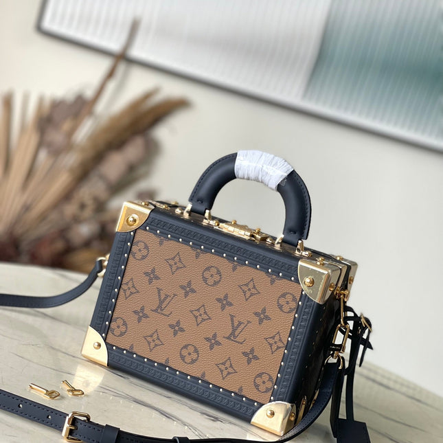 PETITE VALISE 22 IN BROWN MONOGRAM REVERSE CANVAS AND BLACK CALFSKIN TRIM GOLD HARDWARE