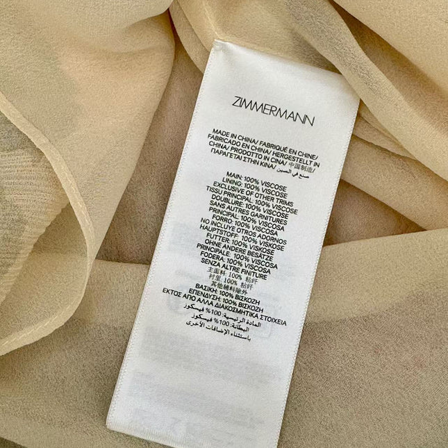 SHEER CHIFFON BLOUSE IN WARM BEIGE WITH RUFFLED COLLAR AND BOW