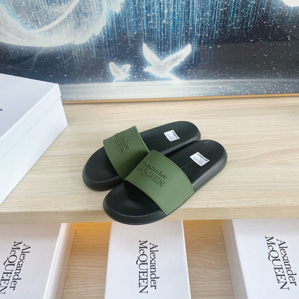 SLIDES SANDAL IN BLACK TPU WITH DARK GREEN STRAP EMBOSSED LOGO