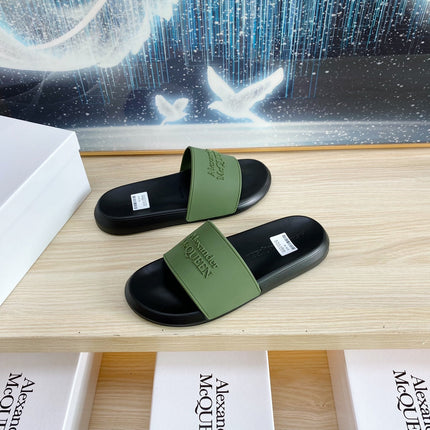SLIDES SANDAL IN BLACK TPU WITH DARK GREEN STRAP EMBOSSED LOGO