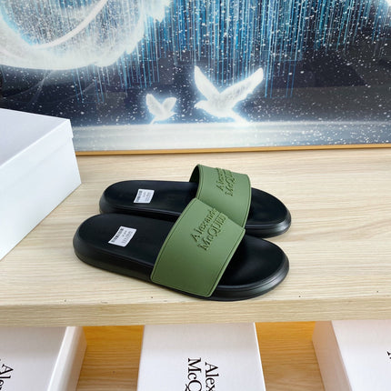 SLIDES SANDAL IN BLACK TPU WITH DARK GREEN STRAP EMBOSSED LOGO