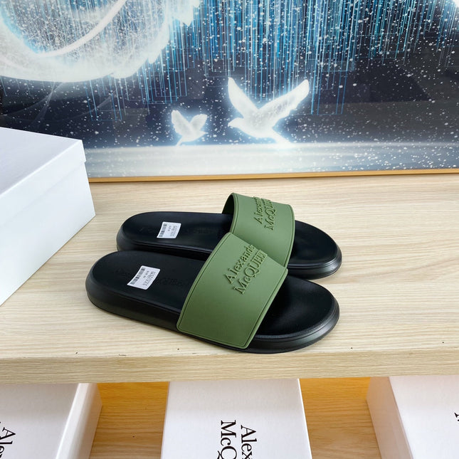SLIDES SANDAL IN BLACK TPU WITH DARK GREEN STRAP EMBOSSED LOGO