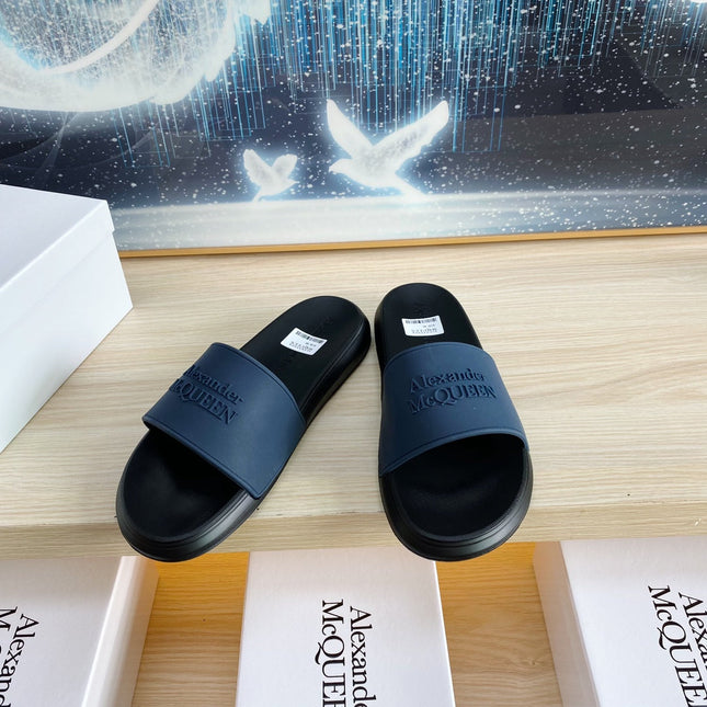 SLIDES SANDAL IN BLACK TPU WITH DARK BLUE STRAP EMBOSSED LOGO