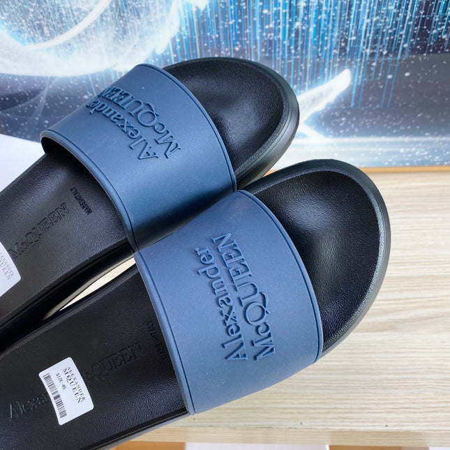 SLIDES SANDAL IN BLACK TPU WITH DARK BLUE STRAP EMBOSSED LOGO