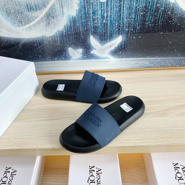 SLIDES SANDAL IN BLACK TPU WITH DARK BLUE STRAP EMBOSSED LOGO