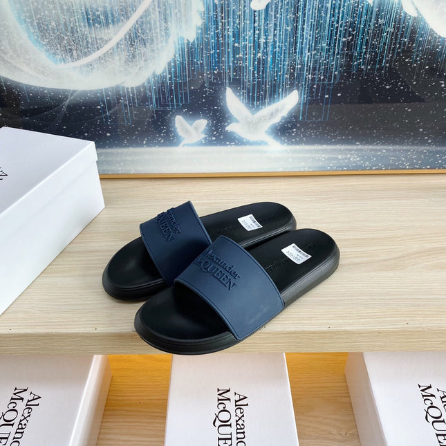 SLIDES SANDAL IN BLACK TPU WITH DARK BLUE STRAP EMBOSSED LOGO