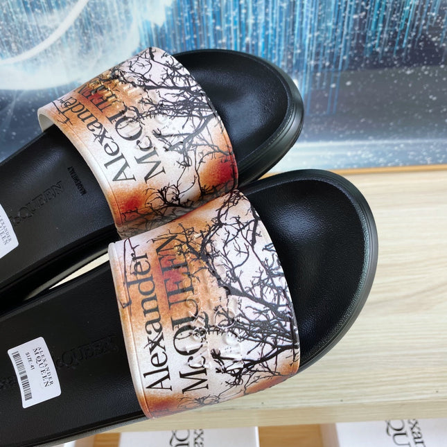 SLIDES SANDAL IN BLACK TPU ORANGE BAND BLACK BRANCH STRAP