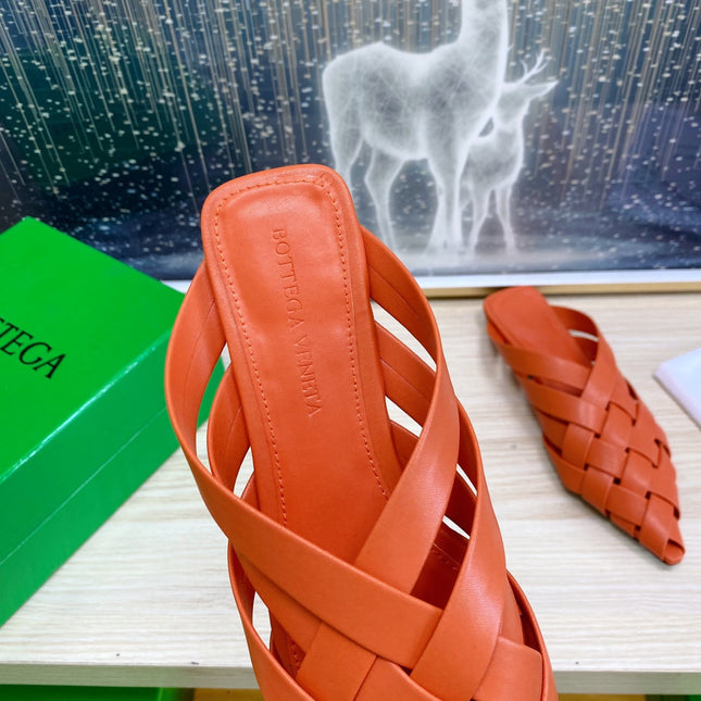 ALFIE LEATHER FLAT MULES IN VIVID ORANGE PATENT CALFSKIN WITH WOVEN DESIGN