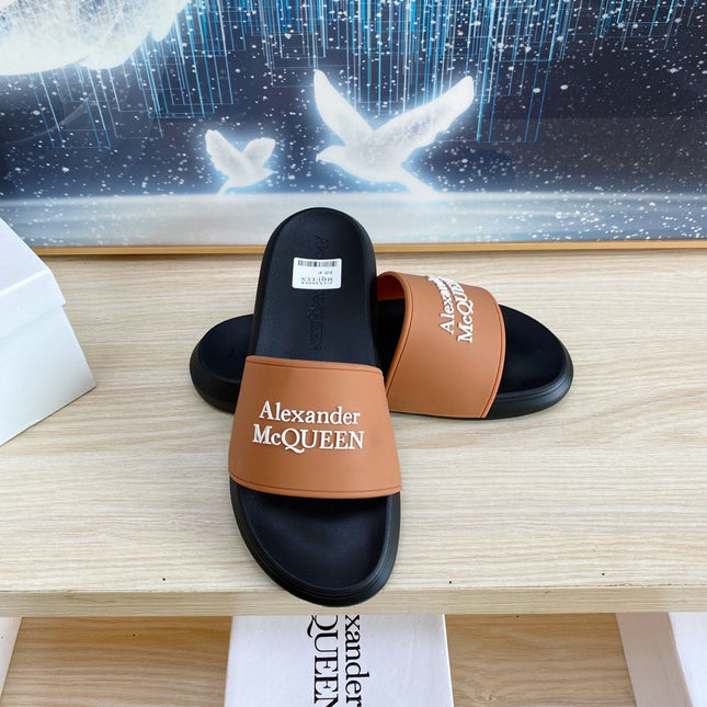 SLIDES SANDAL IN BLACK TPU WITH BROWN STRAP EMBOSSED LOGO