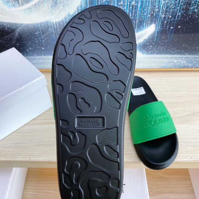SLIDES SANDAL IN BLACK TPU WITH GREEN STRAP EMBOSSED LOGO