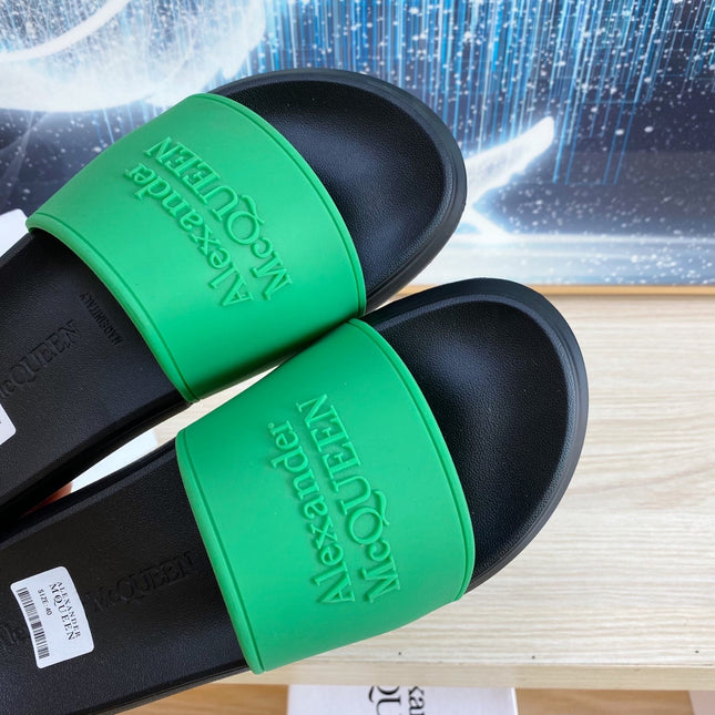 SLIDES SANDAL IN BLACK TPU WITH GREEN STRAP EMBOSSED LOGO
