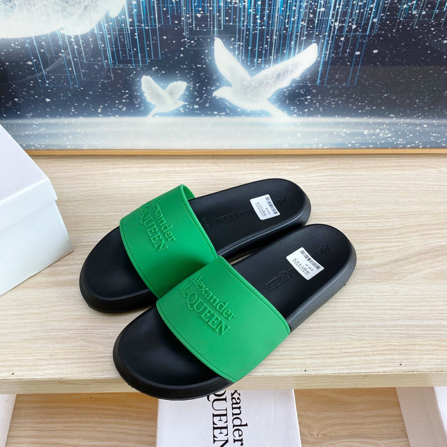 SLIDES SANDAL IN BLACK TPU WITH GREEN STRAP EMBOSSED LOGO