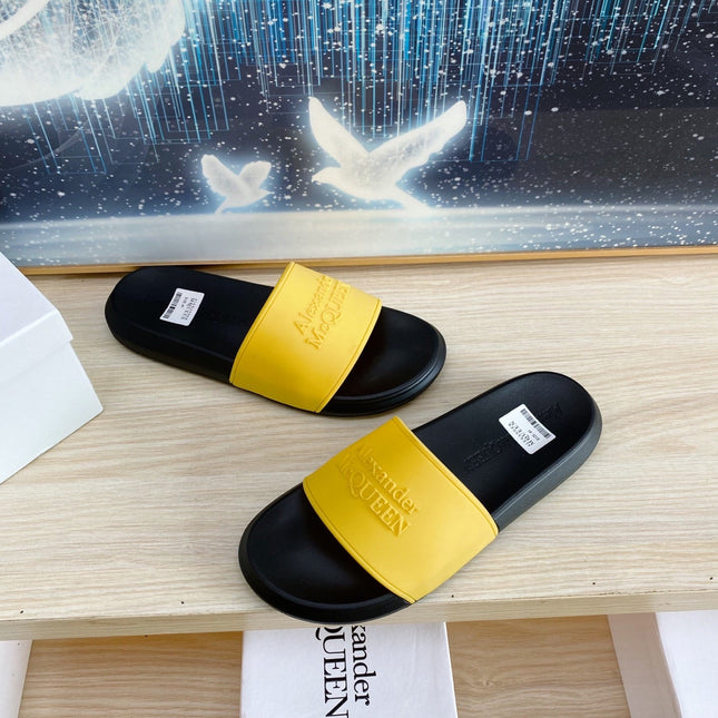 SLIDES SANDAL IN BLACK TPU WITH YELLOW STRAP EMBOSSED LOGO