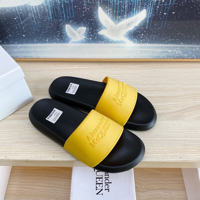 SLIDES SANDAL IN BLACK TPU WITH YELLOW STRAP EMBOSSED LOGO