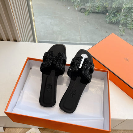 0RAN SLIDE IN BLACK CALFSKIN WITH CRYSTALS