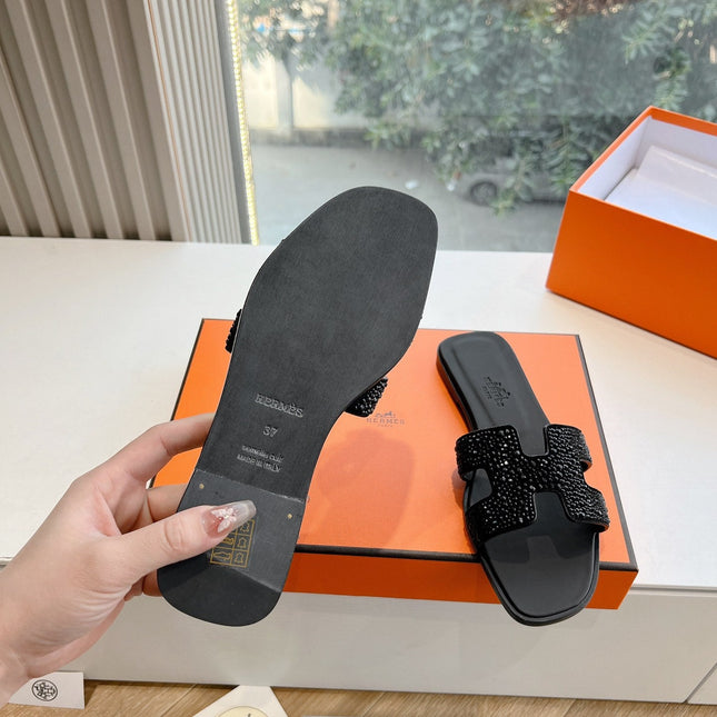 0RAN SLIDE IN BLACK CALFSKIN WITH CRYSTALS