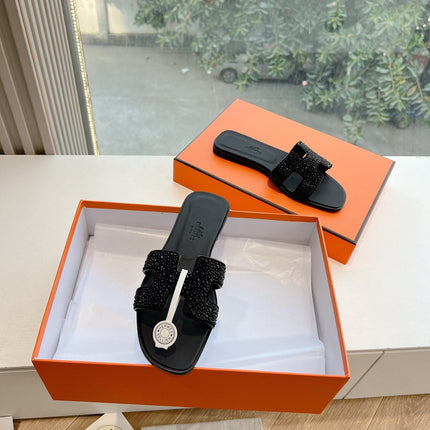 0RAN SLIDE IN BLACK CALFSKIN WITH CRYSTALS