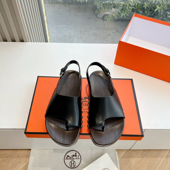 FLAT SANDAL IN BLACK CALFSKIN