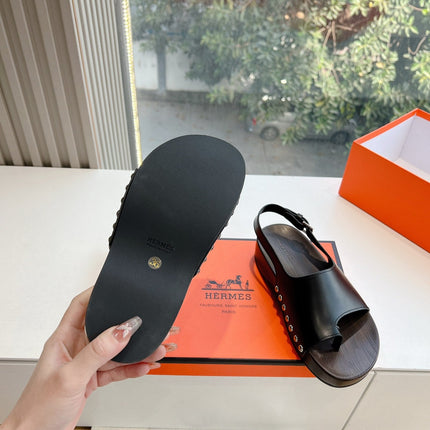 FLAT SANDAL IN BLACK CALFSKIN