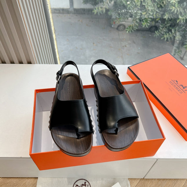 FLAT SANDAL IN BLACK CALFSKIN