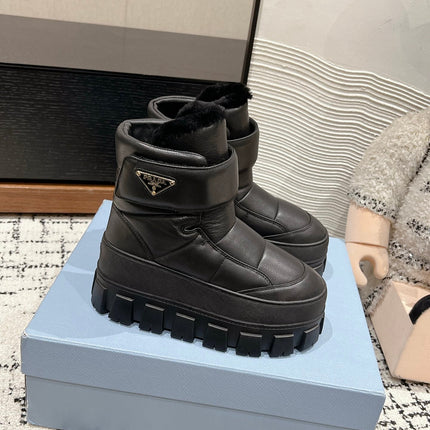 MONOLITH ANKLE BOOTS WITH STRAP IN BLACK CALFSKIN AND FLEECE LINING