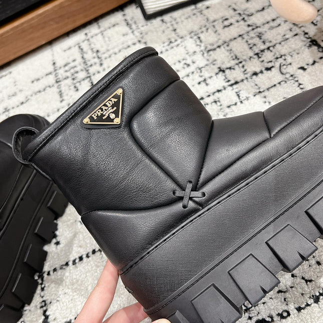 MONOLITH ANKLE BOOTS IN BLACK CALFSKIN AND LAMB FUR LINING