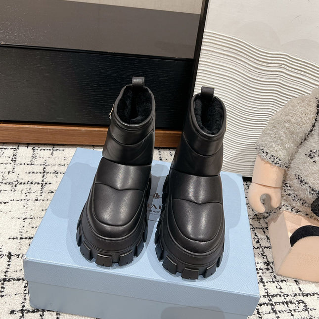 MONOLITH ANKLE BOOTS IN BLACK CALFSKIN AND LAMB FUR LINING