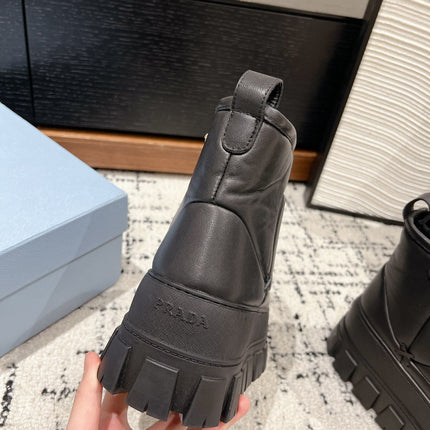 MONOLITH ANKLE BOOTS IN BLACK CALFSKIN AND LAMB FUR LINING