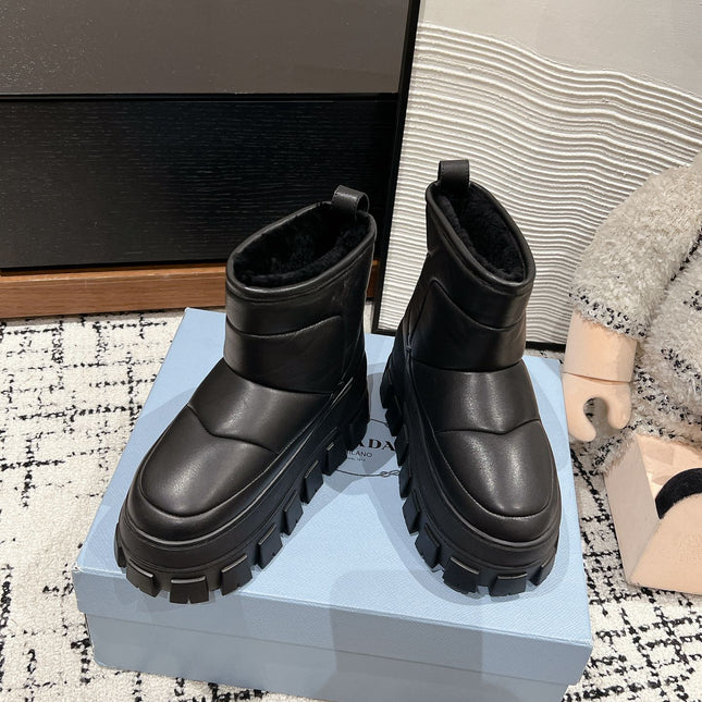 MONOLITH ANKLE BOOTS IN BLACK CALFSKIN AND LAMB FUR LINING