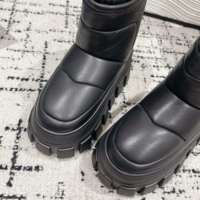 MONOLITH ANKLE BOOTS IN BLACK CALFSKIN AND LAMB FUR LINING