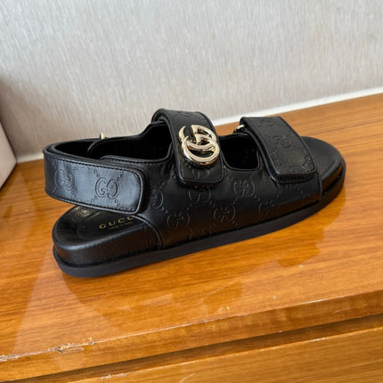 GG SANDALS S25 IN BLACK LAMBSKIN EMBOSSED LOGO WITH GOLD HARDWARE