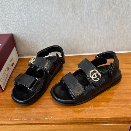 GG SANDALS S25 IN BLACK LAMBSKIN EMBOSSED LOGO WITH GOLD HARDWARE